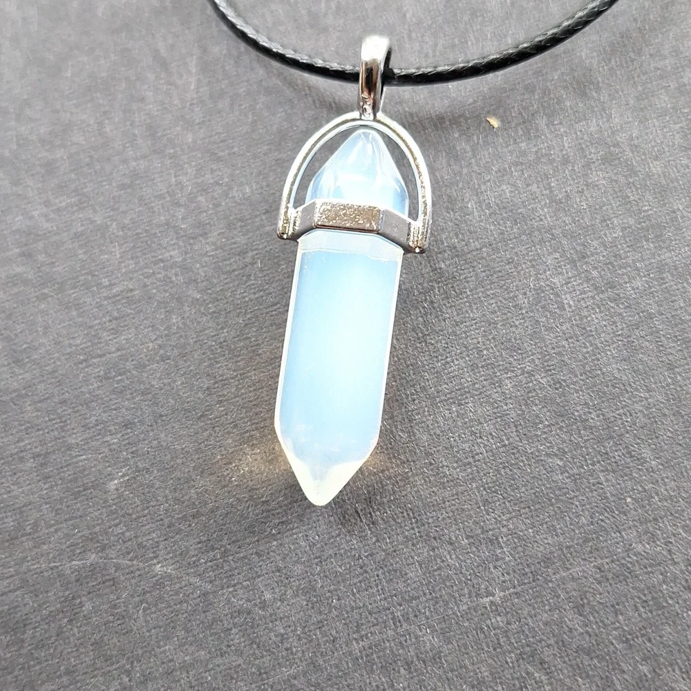 Clear crystal point pendant necklace on 16-inch faux leather chain